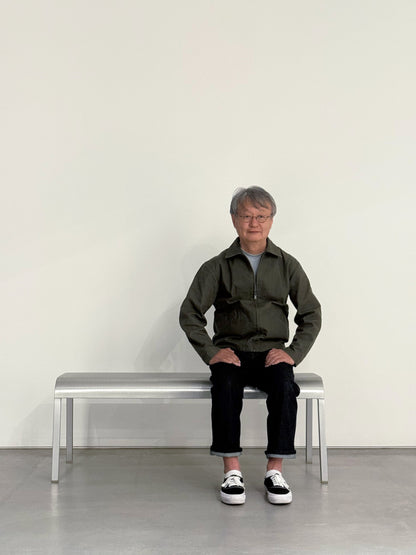 Naoto Fukasawa seated on the Emeco ZaZa bench