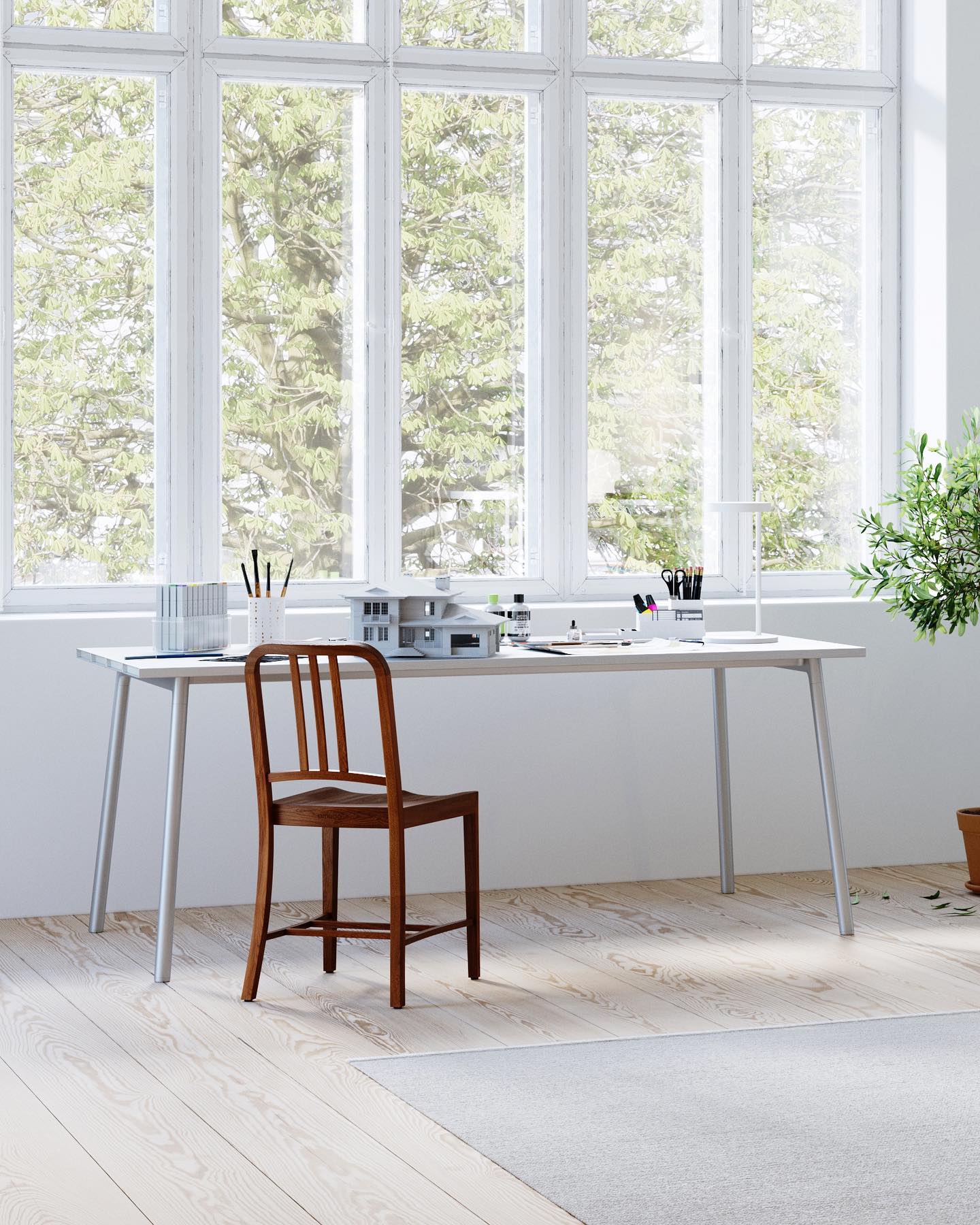 Studio avec immense baie vitré tout blanc.  Bureau étroit design Run Emeco 