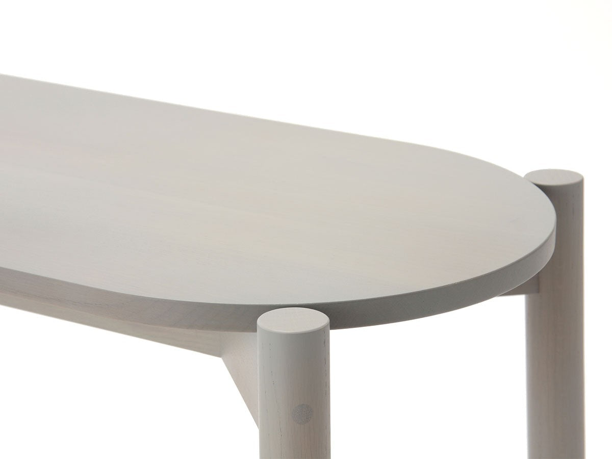 Banco de comedor Castor — detalle del canto del asiento gris y del ensamble de la pata | Antifer