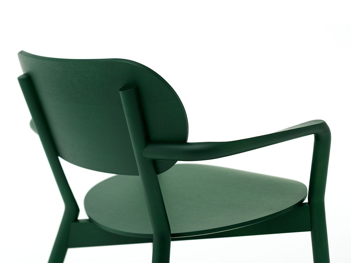 Sillón bajo Castor — detalle del respaldo curvado y del reposabrazos arqueado, en verde oscuro | Antifer