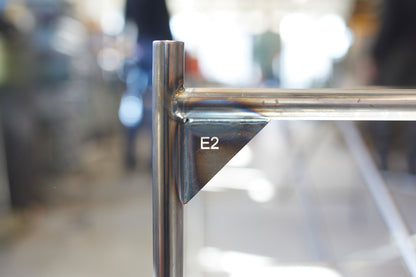 E2 steel table legs assembly and finish detail — minimalist design | Antifer