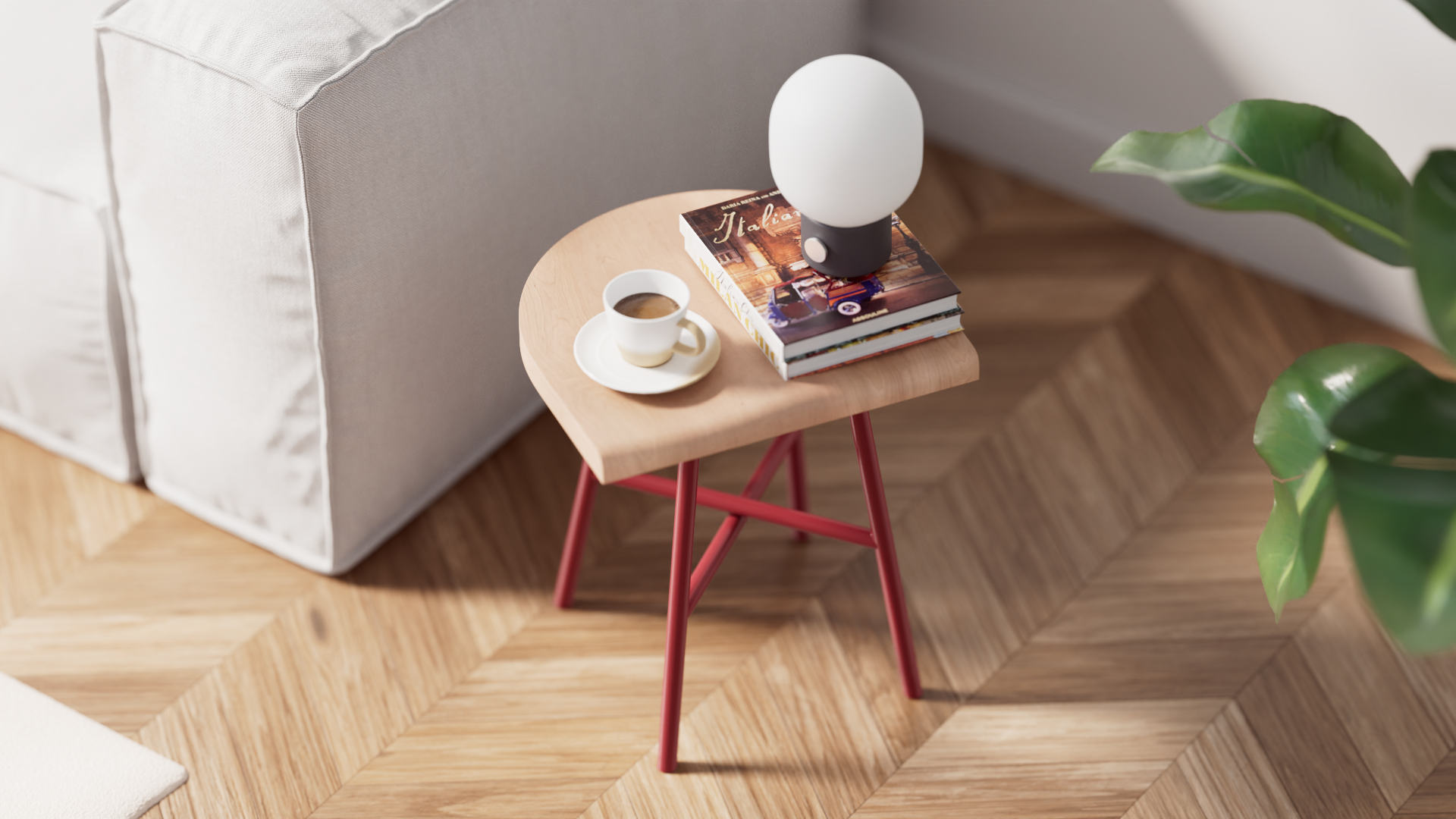 Tabouret bas Camarade en hêtre massif et acier couleur rouille aux côtés d'un canapé vue de haut