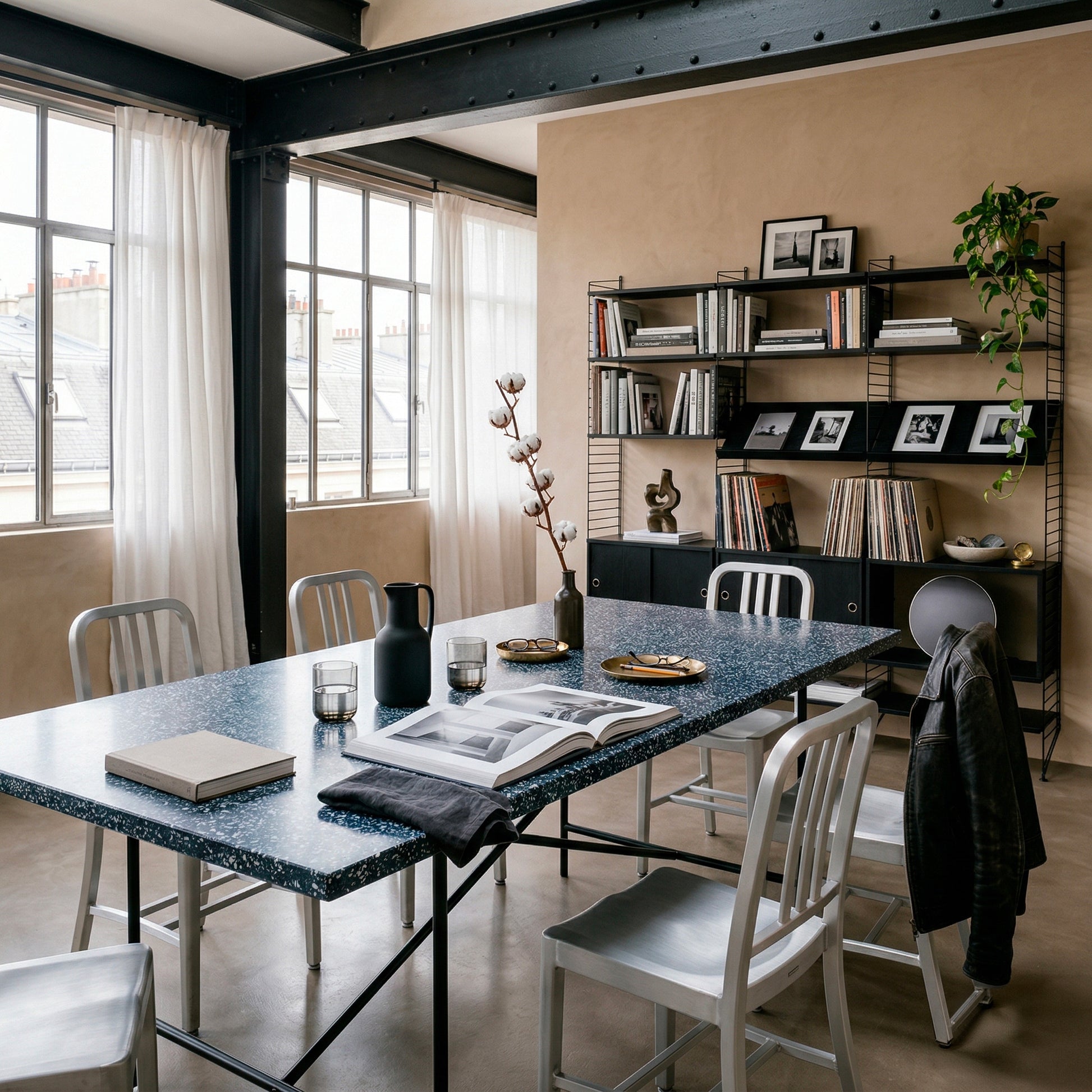 Tabletop Ostrea on on floor concrete with chairs Emeco Navy — marine terrazzo of recycled seashells | Antifer
