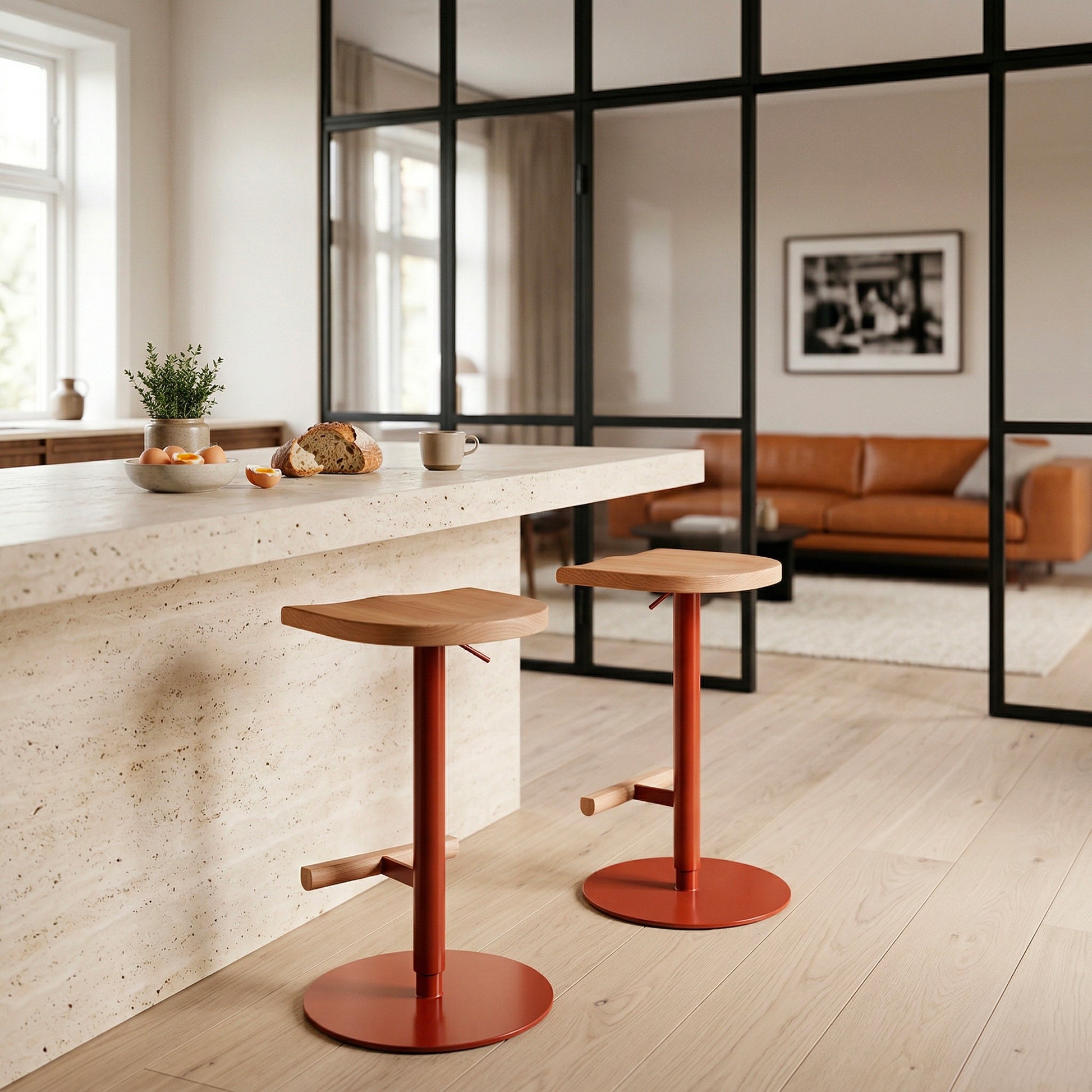 Adjustable Camarade stool in front of steel-framed glass partition and sofa — solid beech and steel, Big-Game | Antifer
