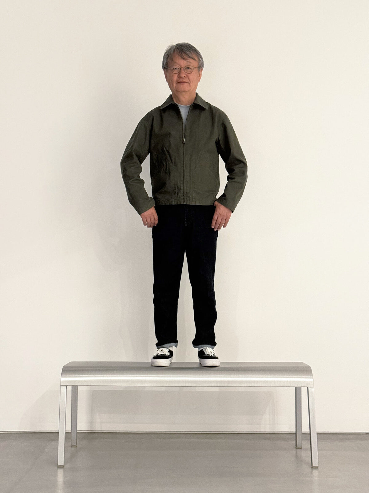 Portrait of Naoto Fukasawa standing on the ZaZa bench