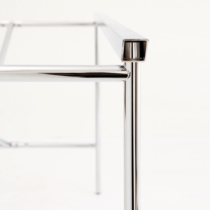 E2 olive green steel table leg three-quarter view — minimalist design | Antifer