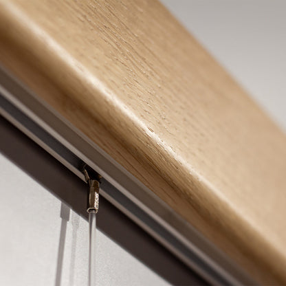 Variand V03 picture rail in situ — oak with hanging frames — Variand design | Antifer