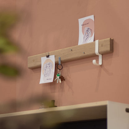Variand V04 magnet rail in situ — oak with postcards — Variand design | Antifer
