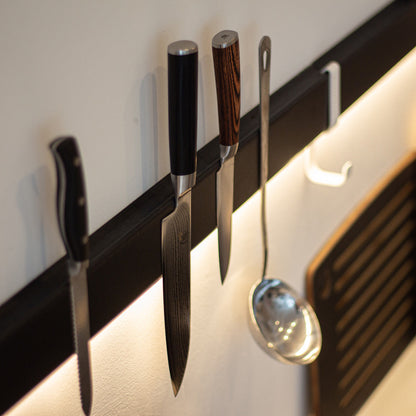 Variand V04 magnet rail in situ — black with wall display — Variand design | Antifer